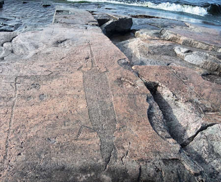 Ancient petroglyphs on Lake Onega, Kaleria, cape Devil's noseの写真素材