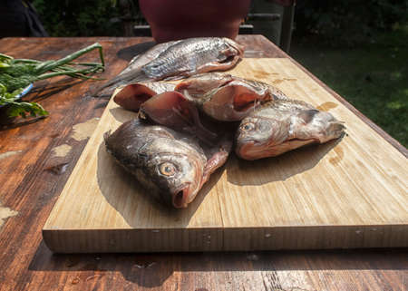 cooking fish soup in the home kitchen. Fish soup is a traditional dish for coastal residents. Home...