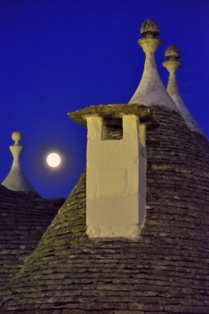 Alberobello - Trulli and the moonの写真素材
