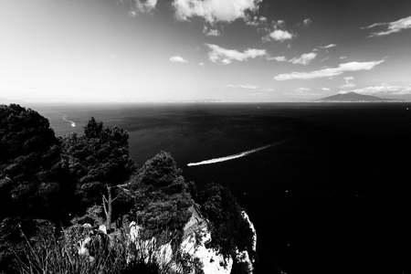 Beautiful aerial view of Napoli gulf from Capri island, with boat trails on the waterの写真素材