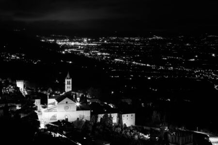 Panoramic view of the historic town of Assisi (Umbria, Italy) at night