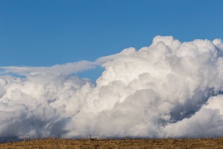 Close view of some fluffy, big clouds.