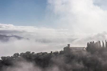 Mist and fog between valley and layers of mountains and hills in Umbria Italyの写真素材