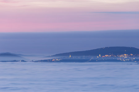 View of Perugia Umbria above a sea of fog at duskの写真素材
