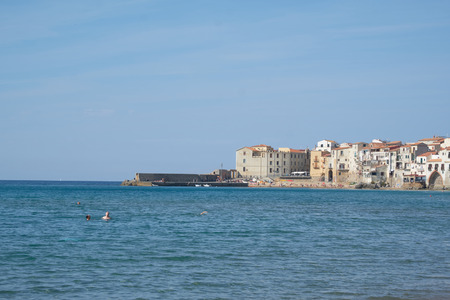 View of beach town of Cefalu in Sicily, Italyの写真素材