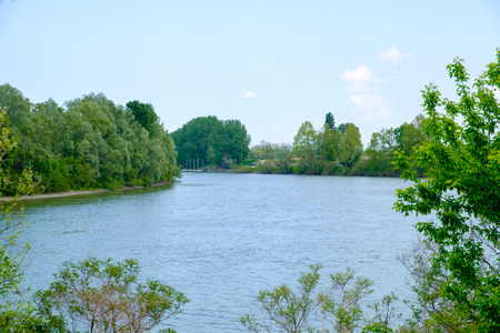 Calm water of Po river in Italyの写真素材