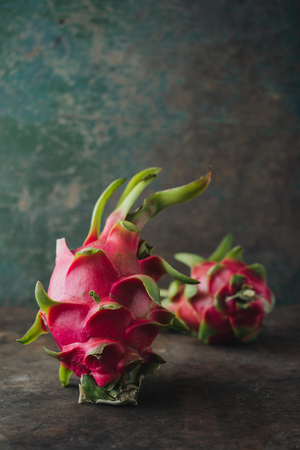 Dragon fruit on rustic backgroundの写真素材