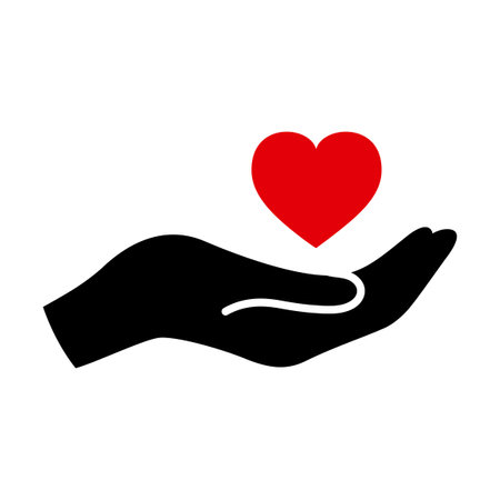 Heart in hand flat iconの写真素材