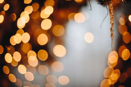 Abstract Orange Circles Bokeh Lemons from Garland. Free Space for Text. Christmas card.の写真素材