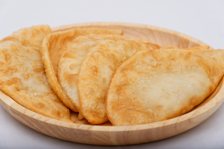 fried chiburekki on a wooden plateの写真素材