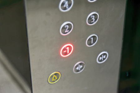 -1 floor button lighten on elevator panelの写真素材