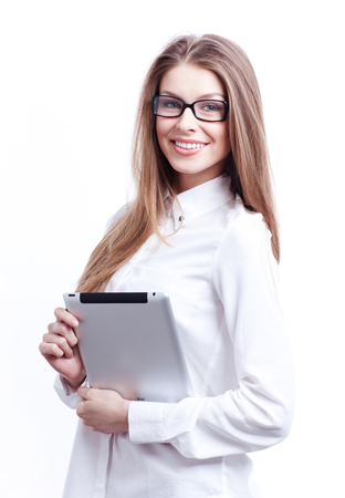 Young woman with digital tablet computer PC isolated on white background wearing white business shirt and glassesの写真素材