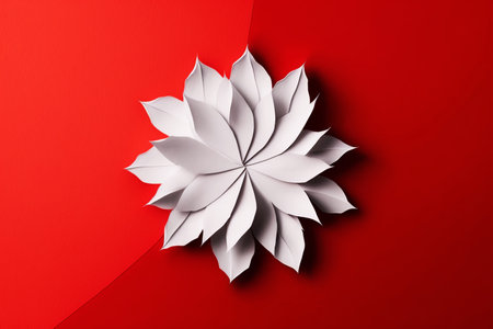 Red abstract paper flower on white paper background. AI generative art.の素材