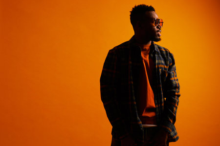 Fashion portrait of handsome African man. Monochromatic fashion look