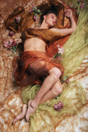 Sexy woman in silkの写真素材