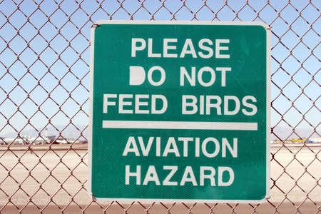 Do not feed birds aviation signの写真素材