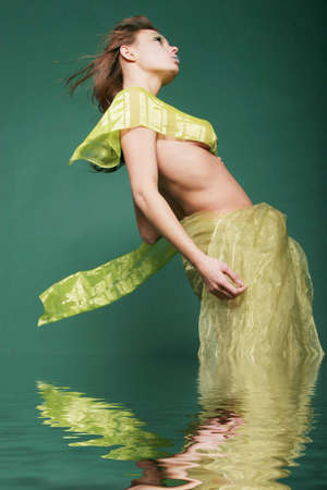 Sexy young female posing artisticの写真素材