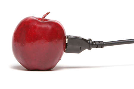 Apple connected to the cableの写真素材