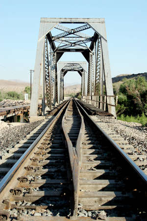 Rail road tracks and bridgeの写真素材