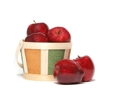 Delicious red apples in a basketの写真素材