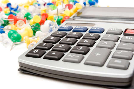 Calculator and colorful pinsの写真素材
