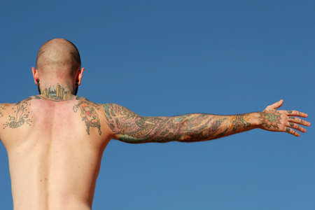Tattooed back of a manの写真素材