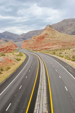 Long stretch of desert highwayの写真素材