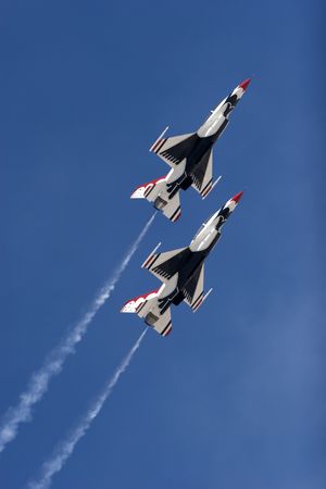 F-16 Thunderbird jets leaving smoke trails