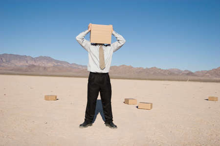 Man with a box over his headの写真素材