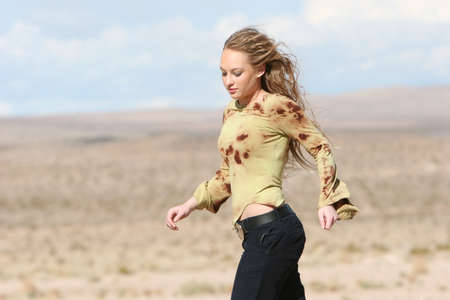 Sexy young woman jogging outdoorsの写真素材