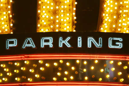 Neon lights parking signの写真素材