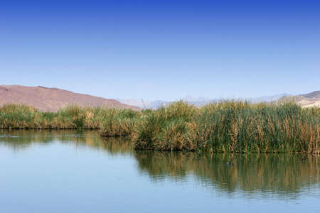 Beautiful lake by the mountainsの写真素材