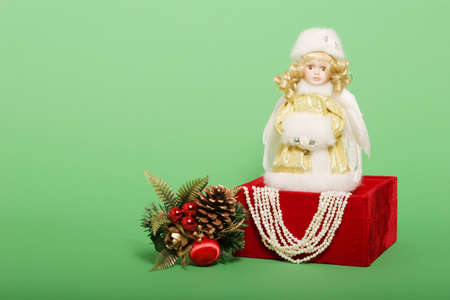 Christmas gifts and decor on green chromakey backgroundの写真素材