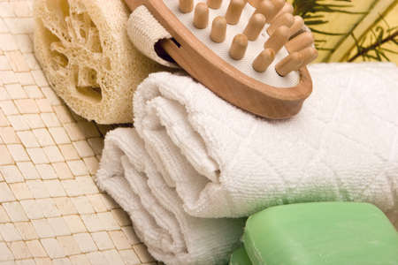 Spa towels, soaps, loofah and massagerの写真素材