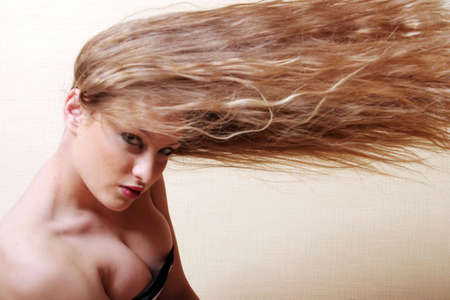 Pretty sexy woman with long blond hairの写真素材