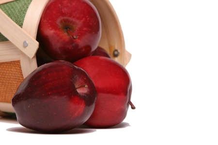 Red delicious apples in basketの写真素材