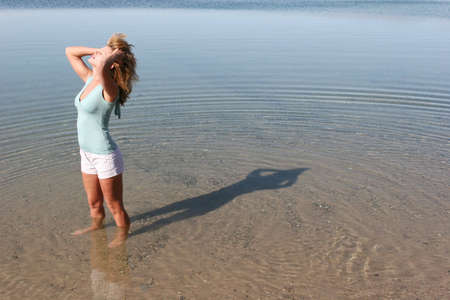 Sexy young woman on the beachの写真素材