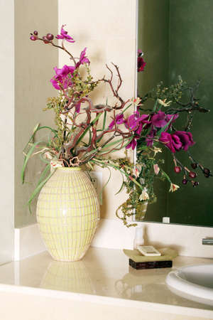 Flowers on the bathroom counterの写真素材