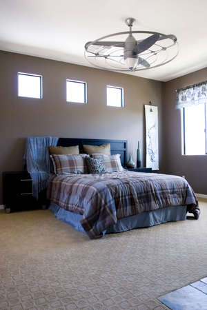 Modern tastefully decorated master bedroomの写真素材