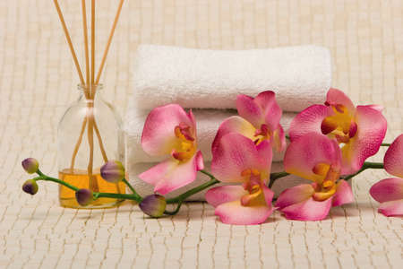 Spa towels and pink orchidの写真素材