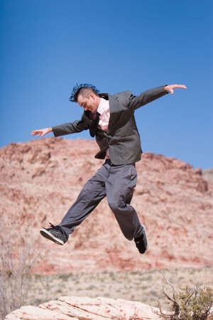 Businessman with alternative style haircut and outfitの写真素材
