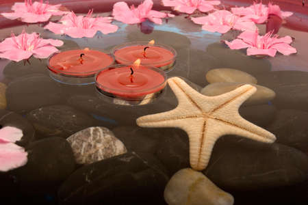 Aromatheraphy with flowers in waterの写真素材