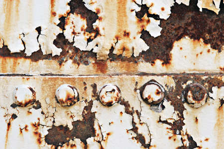 Rusty metal with nailsの写真素材