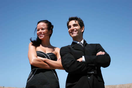 Young successful businessman and businesswoman
