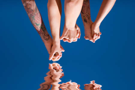 Group of people hands in the airの写真素材