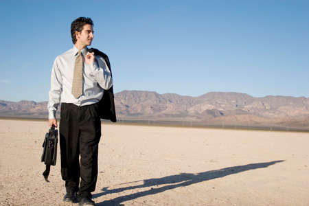 Businessman carrying his laptop caseの写真素材