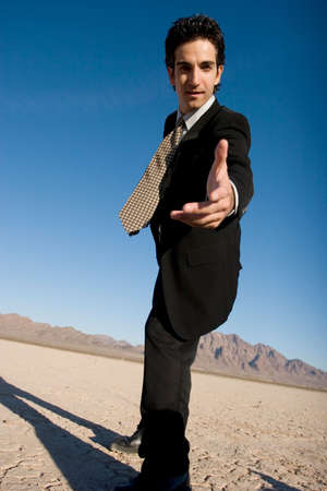 Aggressive businessman in dark suitの写真素材