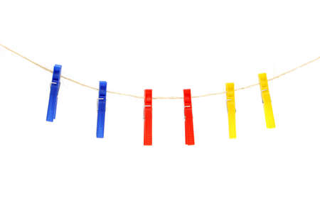 Clothespins hanging on the ropeの写真素材