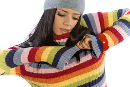 Pretty woman in winter sweater and hat