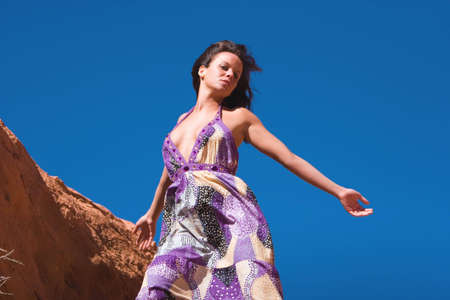 Sexy brunette woman in fashionable dressの写真素材